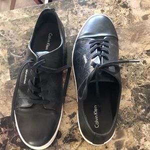 Black Calvin Klein sneakers
